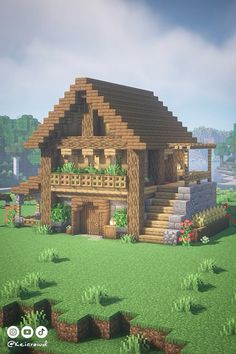 a house made out of wood and grass in the middle of a field with flowers on it