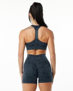 HIGHLIGHTS. Softly brushed on the outside of the garment and smooth on the inside. Moisture-wicking polyester blend. Incredibly stretchy. Medium to Low and includes removable cups. Front wrap neckline. Raised Alphalete rubber logo on the front FIT SUGGESTION This item runs true to Alphalete’s standard sizing. If you are between sizes, we recommend sizing up for a relaxed fit. Model is 5’7”/170cm, wearing a size XS with a 30”/76cm bust. MATERIALS AND WASHING DIRECTIONS. 68% polyester, 32% spandex Wrap Bra, Whale Blue, Waistband Design, Hourglass Shape, Ombre Effect, Womens Bras, Comfort Style, Stretchy Material, Amazing Women