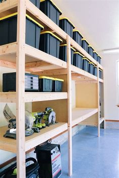 the shelves are filled with many different types of boxes and bins on each shelf