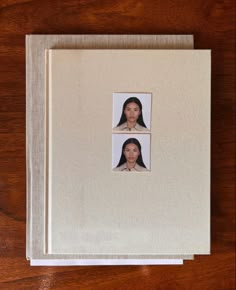 two photographs are placed on top of each other in a white book with the cover pulled down