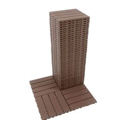 a tall building made out of brown plastic bricks on top of a white flooring