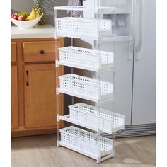 a white refrigerator freezer sitting inside of a kitchen