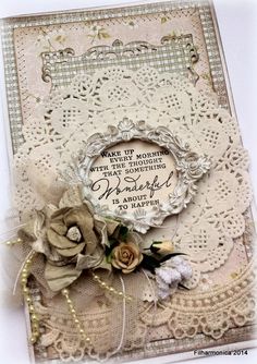 a card with lace and flowers on it