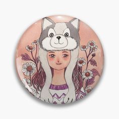 a button with a drawing of a girl and a dog on it's head