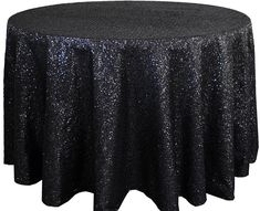 a black table cloth with silver sequins on the top is shown in front of a white background