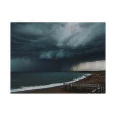 an image of a storm coming in over the ocean on a cloudy day at the beach