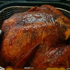 a roasted turkey in an air fryer with the words how to roast chicken on it