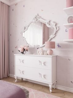 a white dresser sitting in a bedroom next to a pink wallpapered wall with butterflies on it