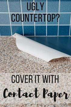 an image of a counter top with the words cover it with contact paper on it