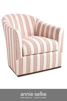 an orange and white striped chair with the name annie selke on it