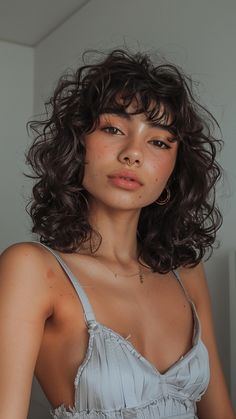 Haircuts For Bouncy Hair, Curly Hair Septum Piercing, Curly Hair Bob Haircut With Bangs, Short Curly Hair Before And After, Curly Hair Bangs Medium Length, Trending Curly Haircuts, Big Curl Perm Short Hair, Queer Curly Hairstyles, Curly Layer Haircut