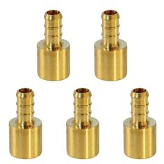 four brass fittings on white background