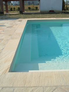 an empty swimming pool with no people around it