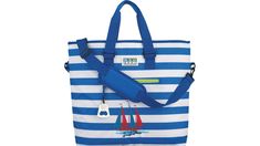 a blue and white striped tote bag with sailboats on the front, zippered closure