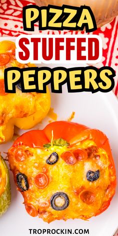 a white plate topped with pizza stuffed peppers