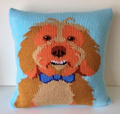 a blue pillow with a brown dog on it