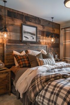 a bed with plaid comforter and pillows in a bedroom next to a wooden headboard