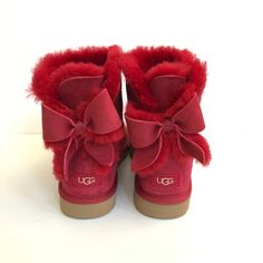 *100% Authentic And Brand New* Product Specs: O 17mm Twinface Sheepskin Upper. O Suede Heel Guard. O Fixed Bow, Sheepskin Bow. O Luxurious 17mm Uggpure 80% Wool, 20% Lyocell Sockliner. O Foam Footbed. O New Treadlite By Ugg Outsole. O Recycled Polyester Binding. O Woven Heel Label With Ugg Logo. O Measurements: Heel Height: 1 In Shaft: 6 In 0 All My Ugg Are 100% Authentic, Brand New And Never Been Worn. ** The Inside Sizing Tag Of The Boot Is Marked To Avoid Store Returns And This However Does Not Effect The Look Of The Boot. Whs N Whs Lss Wine Boots, Baddie Shoes, Red Uggs, Ugg Boots With Bows, Cute Uggs, Uggs With Bows, Mini Baileys, Bow Boots