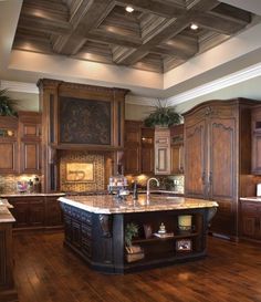 a large kitchen with wooden cabinets and an island in front of a stove top oven