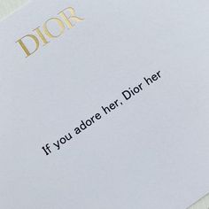 a close up of a piece of paper with the words dior written on it