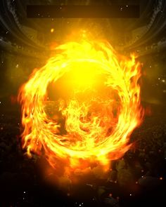 an image of a ring of fire in the middle of a stage with people on it