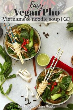 two bowls filled with vegetables and noodles next to chopsticks on a counter top