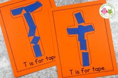 two orange cards with blue letters that spell t is for tape