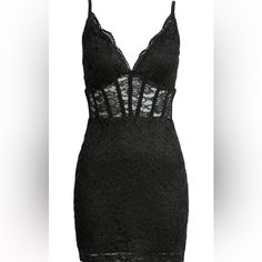 a black dress with lace on it