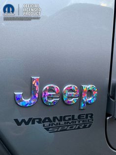 the jeep wrangle logo has been changed to look like holographics