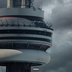 a tall tower with a sky background and clouds