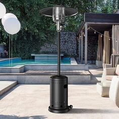 an outdoor patio heater next to a swimming pool