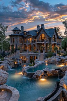 a large house with a pool in front of it