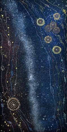 an abstract painting with gold and blue colors on black paper, which has small stars in the sky