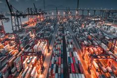 an aerial view of shipping containers at night