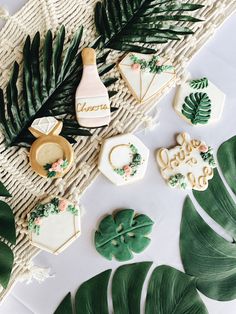 decorated cookies and palm leaves on a table