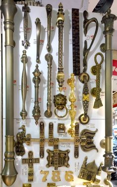 an assortment of antique door handles and knobs