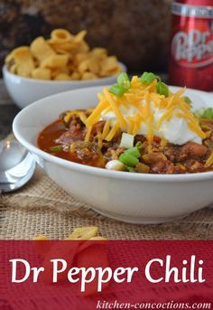 two bowls filled with chili and cheese next to a can of dr pepper chilli