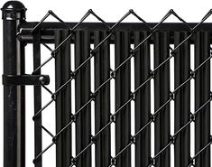 an image of a fence that is made out of metal rods and bars with black paint