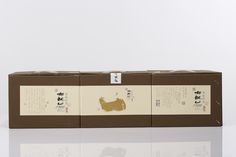 three boxes with chinese writing on them