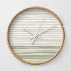 a clock that is on the wall with no numbers in front of it's face