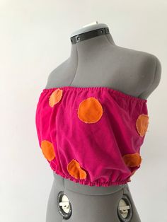 Flirty and thriving at any age! This top will make you feel just that.  Made with all upcycled materials and lots of love, this tube top is two shades of pink on the outside and lined with a gorgeous orange on the inside. It can also be reversed if you so wish! The polka dots are hand cut and the edges of them are unfinished for an extra umph in flirtiness. Top and bottom of top have a thin elastic sewn in to make sure it stays where needed to be! Measurements *without stretch*: Above breast: 24 Designer Working, Dress Ankara, African Print Dress Ankara, African Print Dress, Upcycled Materials, Pattern Ideas, Lots Of Love, Shades Of Pink