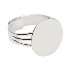 a silver ring with an oval design on the front and side, set against a white background