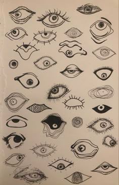 an image of many different types of eyeballs in black ink on white paper,