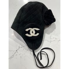 Chanel 22b Black White Suede Quilted Shearling Fur Cc Logo Chapka Winter Hat ********** Chanel ********** Brand: Chanel Size: One Size Name: Chapka Color: Black / White Style: Winter Hat Style#: Aa8512 B08953 Nj894 Season: 22b Material: 100% Dyed Lamb Shearling Cc White Logo On Black Circle Shearling Logos Black Quilted Suede Material Drawstring Ties One Size Fits All Shearling Fur Lined Inside Chapka Winter Hat Russian Style Super Rare Sold Out Worldwide 100% Authentic Or Your Money Back Brand Winter Hat Style, Hat Chanel, Chanel Brand, Black Circle, Russian Style, Hat Style, Chanel Accessories, Russian Fashion, Style Winter