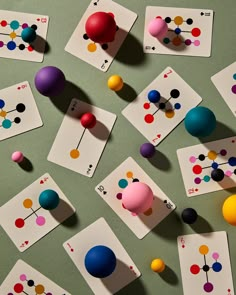 several cards with different shapes and numbers on them, all arranged in the same pattern