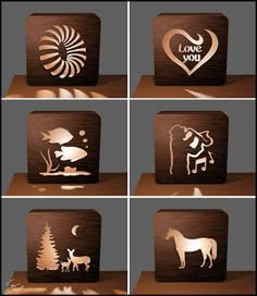 four wooden signs with different types of animals and trees in the shape of heart, love you