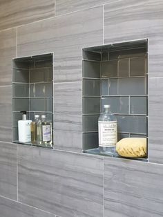 two shelves in the wall with soap and lotion