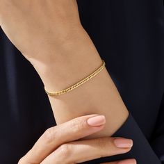 This delicate, handcrafted piece, designed for women, combines minimalist aesthetics with timeless charm. Crafted from real solid gold, it's a symbol of quality and durability. The Cuban links add a unique twist to the classic design, making it perfect for both day and night. Lightweight and flexible, it's ideal for layering with other Norm Jewels pieces.  Cherish not just a bracelet, but a handmade work of art with a story of quality craftsmanship and minimalist design. Bracelet Chain Details ❥ Gold KT: 14k Solid  Gold ❥ Chain Width: 2.90 mm ❥ Chain Thickness: 1.20 mm ❥ Gold Color Options: Yellow Gold, White Gold ❥ Ready to Ship in 4-7 Business Days MORE FROM US More Bracelets: https://etsy.me/3nc1GYi More about my shop: https://etsy.me/3mwMnsA ESSENTIAL INFORMATION 💎 BRENNMORE pieces ar Adjustable Tarnish Resistant Minimalist Chain Bracelet, Classic Adjustable Bracelet With Delicate Chain, Delicate Gold Jubilee Bracelet For Everyday Wear, Delicate Jubilee Gold Bracelet For Everyday Wear, Delicate Jubilee Gold Bracelet For Everyday, Minimalist Chain Bracelet With Box Chain Bangle, Minimalist Bangle Chain Bracelet With Box Chain, Minimalist Box Chain Bracelet For Everyday, Minimalist Yellow Gold Jubilee Bracelets