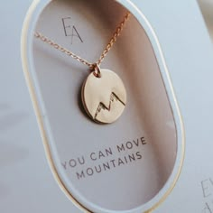 You can move mountains.Product DetailsNecklace comes in either gold-filled or sterling silverChain can be adjusted from 16 to 18 inchesCharm measures 1/2 inches in diameterHand stamped2 inch necklace extenders can be purchased separatelyEver Aster inspires meaningful connections by spreading hope and simplicity through its jewelry. These pieces are the perfect gift to convey a heartfelt message to your loved one that shines with thoughtfulness, kindness, and gratitude. We hope you find as much j Cheap Inspirational Engraved Jewelry, Meaningful Jewelry Boho, Cheap Meaningful Jewelry For Gifts, Meaningful Necklace Gold, Inspirational Jewelry As Gift, Jewelry Made From Old Wedding Rings, Meaningful Necklaces, Jewelry Gold Necklaces, Meaningful Gift Ideas