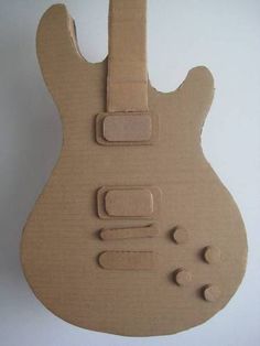 an electric guitar made out of cardboard